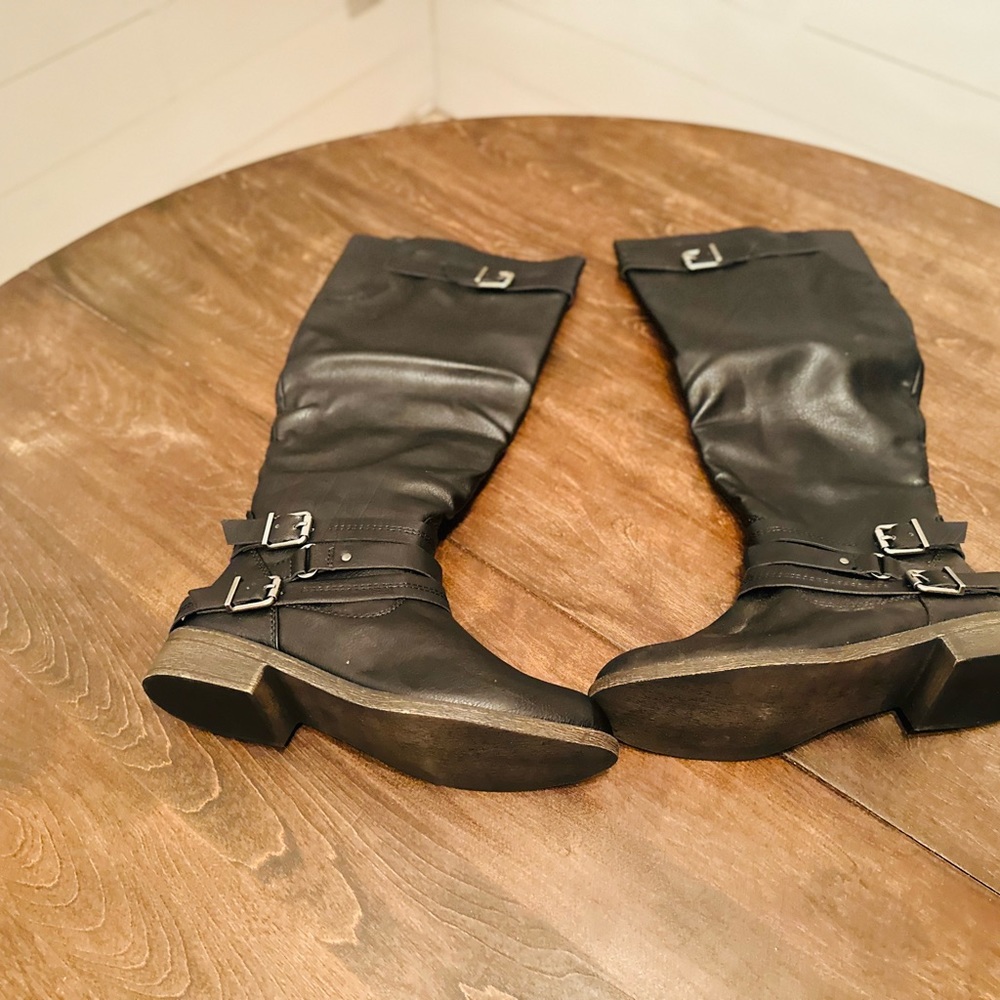 Women’s Black Leather Knee-High Boots with Buckle Details